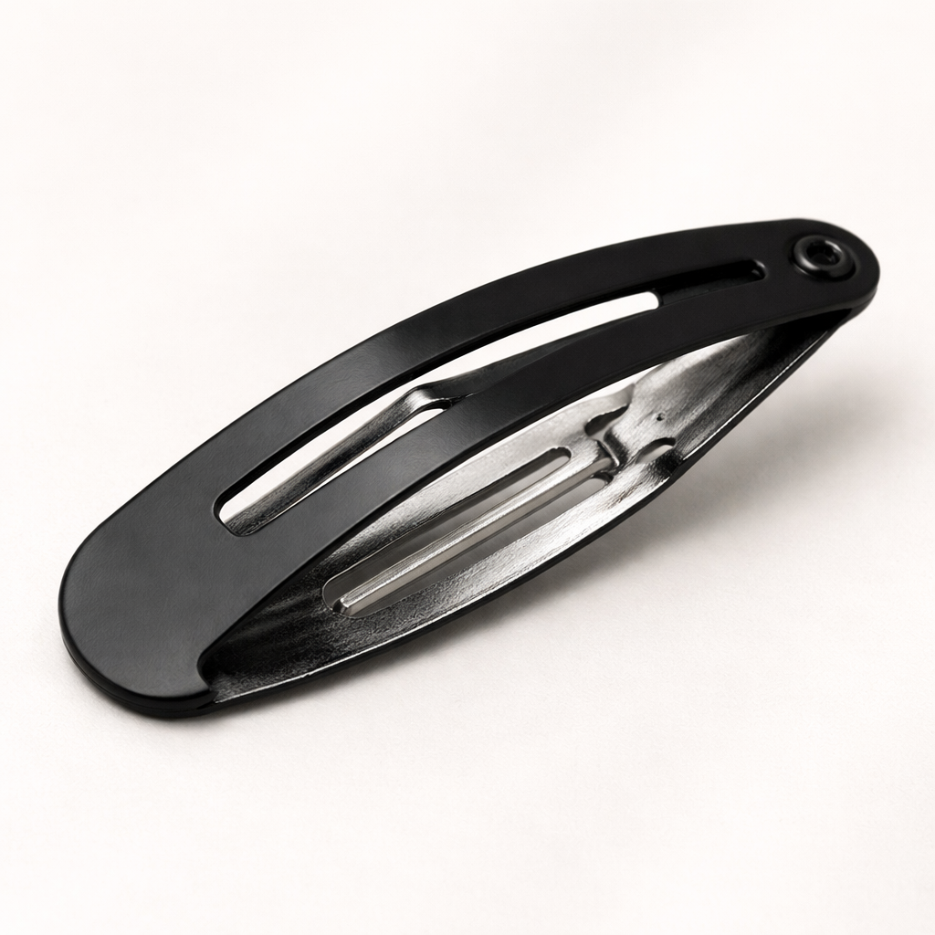 Black snap hair clip close-up
